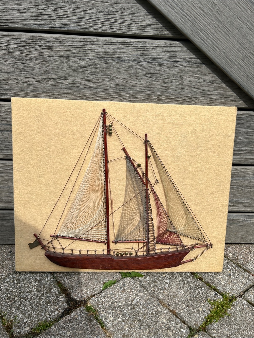 vintage wooden ship string art wall hanging featuring a schooner